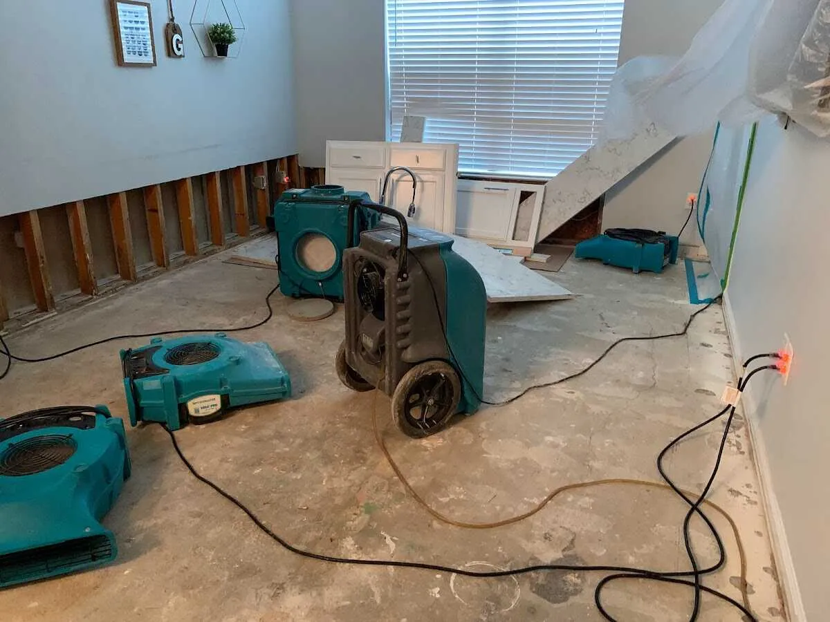 Dehumidifier in flood-cut room for Water Damage Restoration in Burien